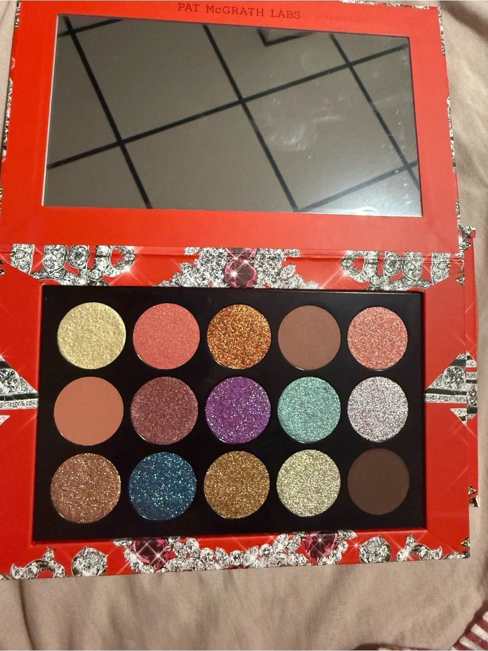 Pat mcgrath labs luminous legends mega eye shadow palette.